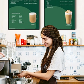 barista working behind counter